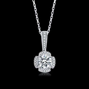 Brilliant Moissanite Diamond Pendant with a Halo of Diamonds around center stone